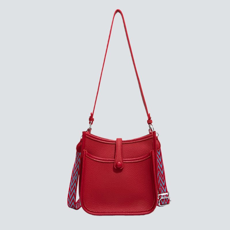 Dual-Strap Leather Bucket Bag with Patterned Accents