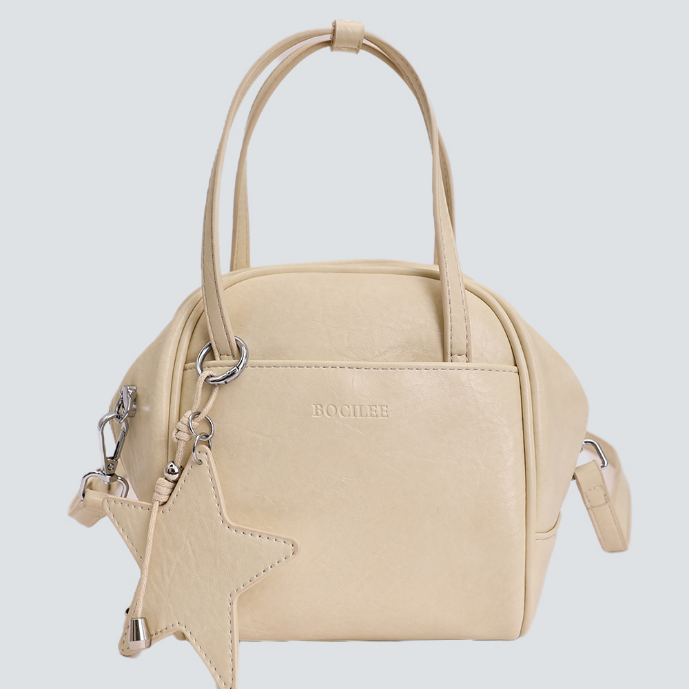 Caramel Vintage Waxed Leather Mini Handbag With Star Charm - Image 4