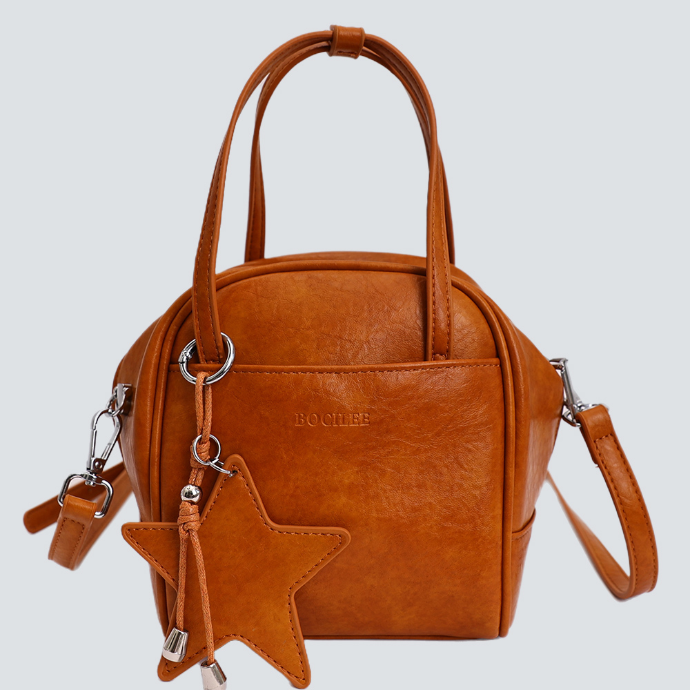 Caramel Vintage Waxed Leather Mini Handbag With Star Charm